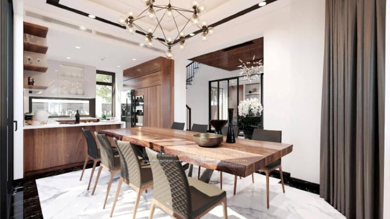 Sẽ là một gợi ý sáng tạo sẽ khiến bạn thích thú như trong mẫu thiết kế không gian bếp hiện đại biệt thự Vinhomes Imperia Hải Phòng trong đây, bố trí kệ trang trí ở vị trí gần bàn ăn nhất giúp bạn lấy ly, chén một cách nhanh chóng.